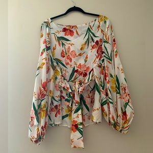 Floral long puffy sleeve blouse with waist tie.